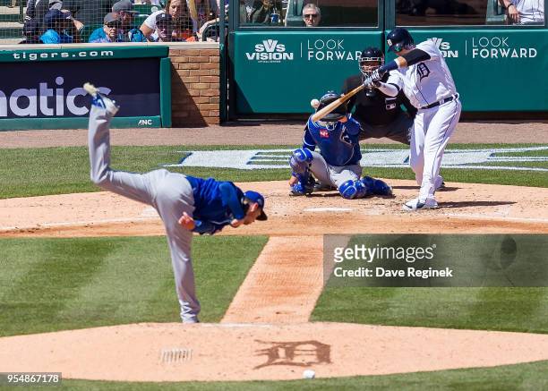 Eric Skoglund of the Kansas City Royals pitches to Victor Martinez of the Detroit Tigers during a MLB game at Comerica Park on April 22, 2018 in...