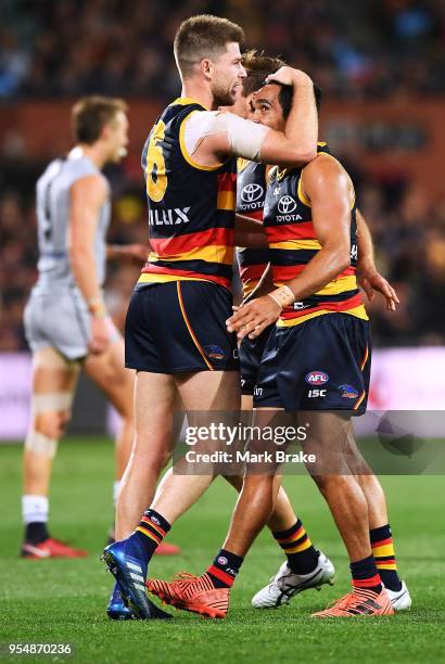 Bryce Gibbs of the Adelaide Crows and Eddie Betts of the Adelaide Crows celebrates a goal during the round seven AFL match between the Adelaide Crows...