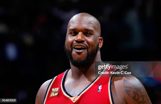 Shaquille O'Neal of the Cleveland Cavaliers laughs after a play against the Atlanta Hawks at Philips Arena on December 29, 2009 in Atlanta, Georgia....