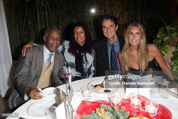 Actor Danny Glover, his guest, Giulio Base and Tiziana Rocca attend the third day of the 14th Annual Capri Hollywood International Film Festival on...