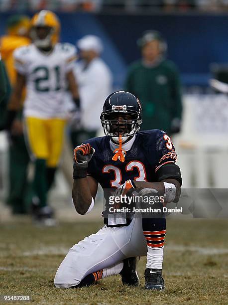 Charles Tillman of the Chicago Bears celebrates a field goal miss by Mason Crosby of the Green Bay Packers at Soldier Field on December 13, 2009 in...
