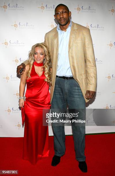 Simine Hashemizeh and Didier Mbenga arrive at Simine Hashemizdeh's Holiday Red Carpet Event To Benefit M Benga Foundation on December 10, 2009 in...