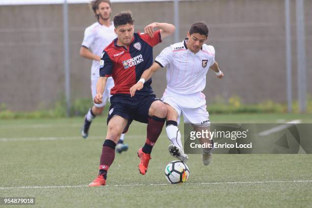 Jose Maria Silva Marques of Palermo U19 battles for the ball with Riccardo Donadiotto of Cagliari U19 during the Primavera 1 match between Cagliari...