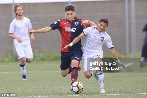 Jose Maria Silva Marques of PAlermo U19 battles for the ball with Riccardo Donadiotto of Cagliari U19 during the Primavera 1 match between Cagliari...