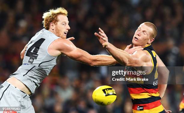 Andrew Phillips of the Blues competes against Sam Jacobs of the Adelaide Crows during the round seven AFL match between the Adelaide Crows and the...