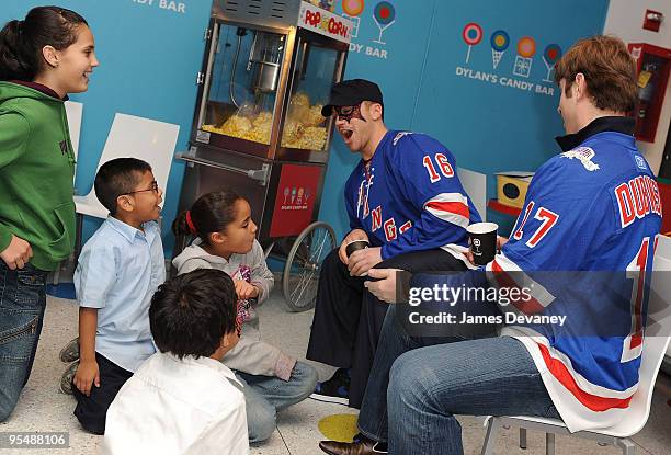 Sean Avery and Brandon Dubinsky of the New York Rangers host Garden Of Dreams Foundation event for 20 children at Dylan's Candy Bar on December 3,...