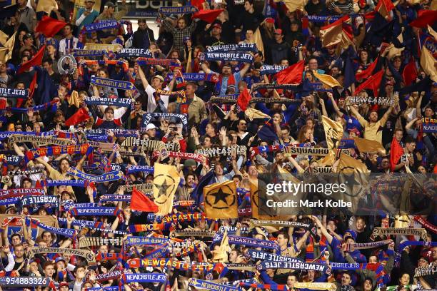 Jets supporters sing during the 2018 A-League Grand Final match between the Newcastle Jets and the Melbourne Victory at McDonald Jones Stadium on May...