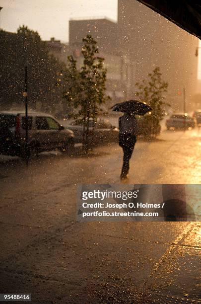 rain sunset - joseph o. holmes stock pictures, royalty-free photos & images