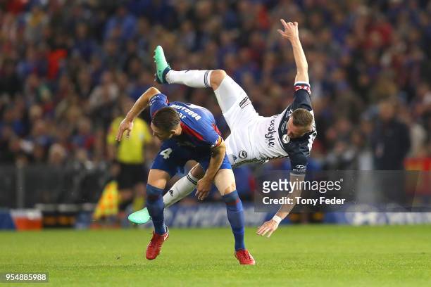 Besart Berisha of Victory and Nigel Boogaard of the Jets contest the ball during the 2018 A-League Grand Final match between the Newcastle Jets and...
