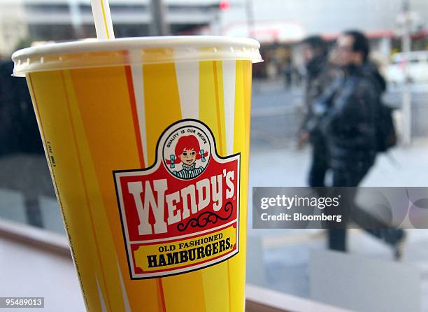 The logo for Wendy's is displayed on a paper cup in the fast-food restaurant in the Ginza district of Tokyo, Japan, on Friday, Dec. 18, 2009....