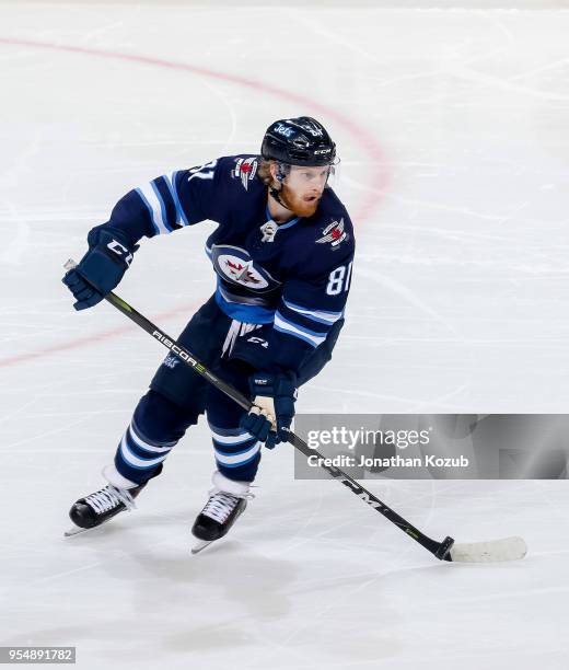 Kyle Connor of the Winnipeg Jets plays the puck down the ice during second period action against the Nashville Predators in Game Three of the Western...