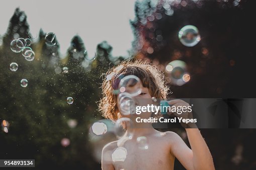 Boy making bubbles outdoor Boy making bubbles outdoor