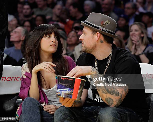 Nicole Richie and Joel Madden attend a game between the Golden State Warriors and the Los Angeles Lakers at Staples Center on December 29, 2009 in...