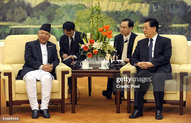 China's President Hu Jintao meets with with Nepal's Prime Minister Madhav Kumar Nepal at the Great Hall of the People in Beijing on December 30, 2009...