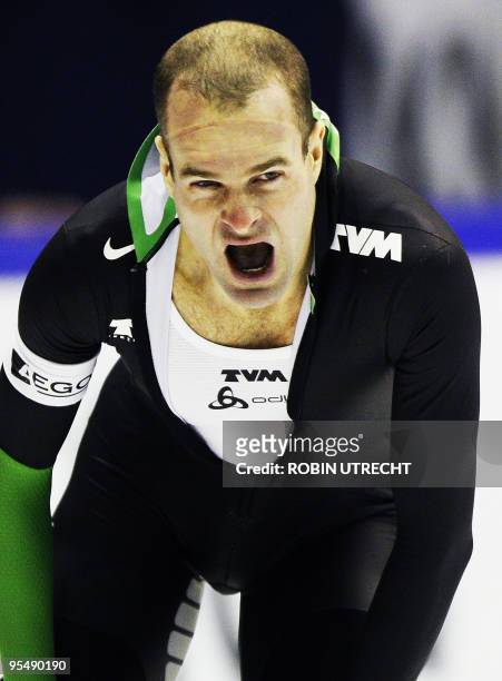 Dutch speedskater Erben Wennemars reacts after the 1500 meters speedskating during the Olympic Qualification Tournament in Heerenveen, on December...