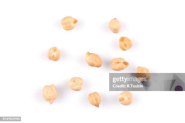 close up on chickpeas isolated on white background - chickpea stock pictures, royalty-free photos & images