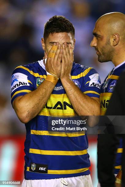 Mitchell Moses of the Eels shows his emotion after missing a kick conversion at full time alongside Tim Mannah of the Eels after the round nine NRL...