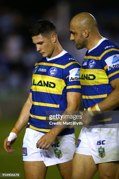 Mitchell Moses of the Eels shows his emotion after missing a kick conversion at full time alongside Tim Mannah of the Eels after the round nine NRL...