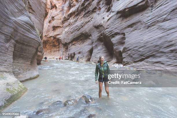 slot canyon abenteuer - zion national park stock-fotos und bilder