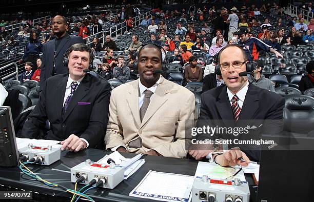 Broadcasters Kevin McHale, Chris Webber, and Ernie Johnson pose for a photo before the game between the Atlanta Hawks and the Cleveland Cavaliers on...