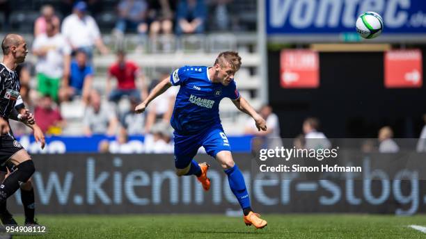 Marvin Pourie of Karlsruhe scores his team's first goal with a header during the 3. Liga match between VfR Aalen and Karlsruher SC at Ostalb Arena on...