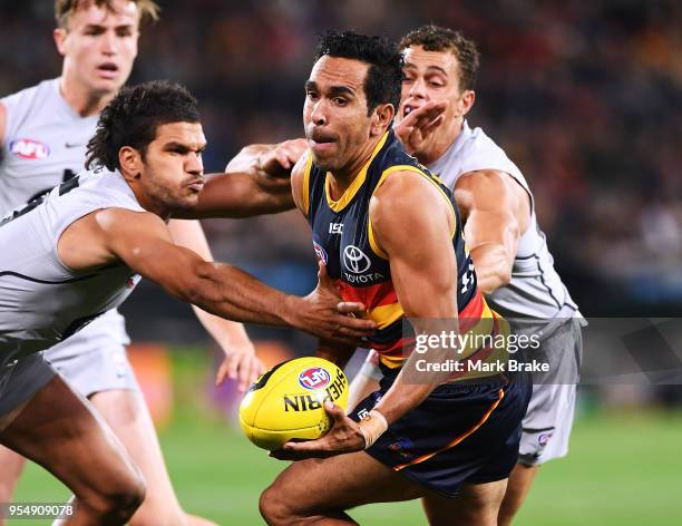 Eddie Betts of the Adelaide Crows under pressure from Sam Petrevski-Seton of the Blues during the round seven AFL match between the Adelaide Crows...