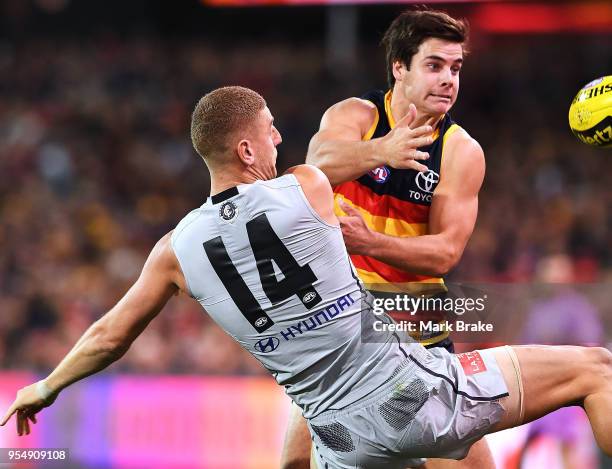 Darcy Fogarty of the Adelaide Crows and Liam Jones of the Blues during the round seven AFL match between the Adelaide Crows and the Carlton Blues at...