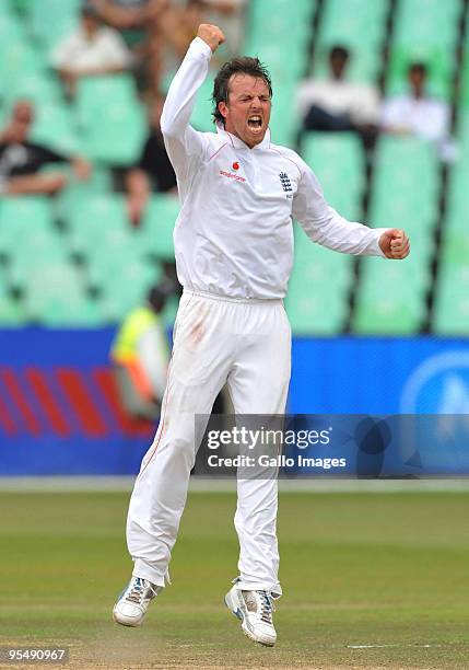 Graeme Swann of England celebrates the last wicket and victory during day 5 of the 2nd test match between South Africa and England at the Sahara...