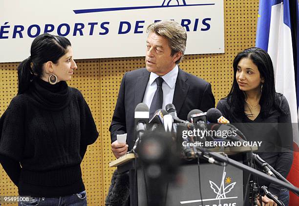French junior minister for Cooperation and Francophonie, Alain Joyandet gives a press conference next to French prisoners Celine Faye and Sarah...
