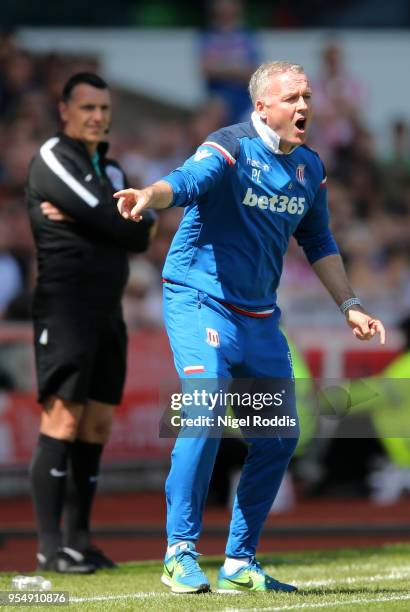 Paul Lambert, Manager of Stoke City gives his team instructions during the Premier League match between Stoke City and Crystal Palace at Bet365...