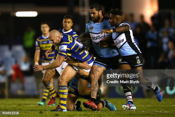David Gower of the Eels is tackled during the round nine NRL match between the Cronulla Sharks and the Parramatta Eels at Southern Cross Group...