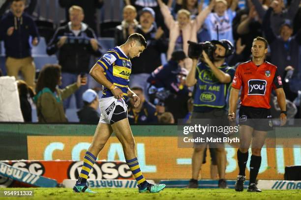 Mitchell Moses of the Eels reacts after missing a kick conversion at full time during the round nine NRL match between the Cronulla Sharks and the...