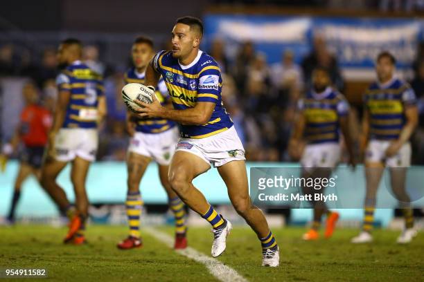 Corey Norman of the Eels runs the ball during the round nine NRL match between the Cronulla Sharks and the Parramatta Eels at Southern Cross Group...