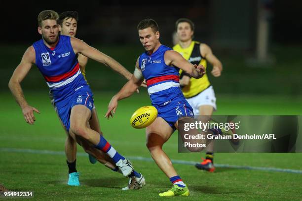 Joshua Wallis of Footscray kicks during the round five VFL match between Footscray and Richmond at Whitten Oval on May 5, 2018 in Melbourne,...