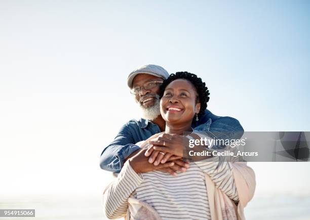 life is a thousand times brighter with you by my side - african american man day dreaming stock pictures, royalty-free photos & images