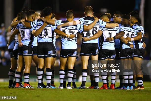 The Sharks pay respect with a minutes silence before the round nine NRL match between the Cronulla Sharks and the Parramatta Eels at Southern Cross...