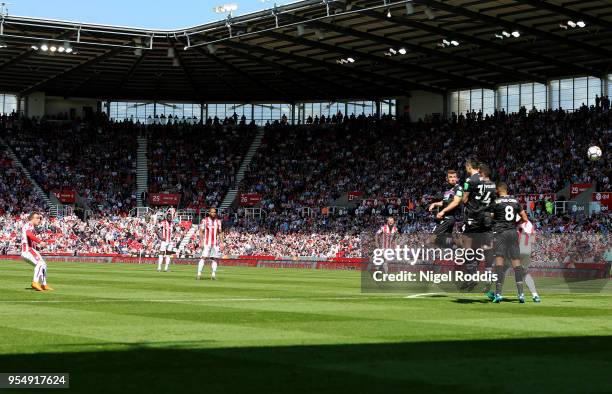 Xherdan Shaqiri of Stoke City shoots and scores his side's first goal during the Premier League match between Stoke City and Crystal Palace at Bet365...