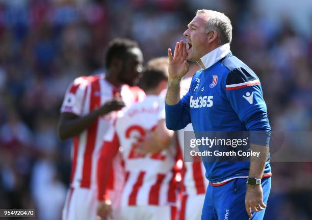 Paul Lambert, Manager of Stoke City gives his team instructions during the Premier League match between Stoke City and Crystal Palace at Bet365...