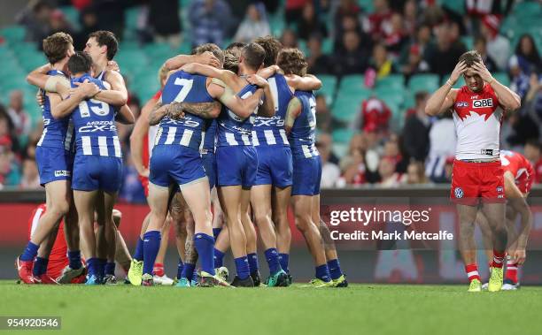 Kangaroos players celebrate victory in the round seven AFL match between the Sydney Swans and the North Melbourne Kangaroos at Sydney Cricket Ground...