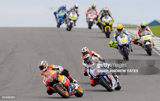 Andrea Dovizioso of Italy leads the British Grand Prix at Donington Park, in Leicestershire, central England, on July 26, 2009. Dovizioso won ahead...