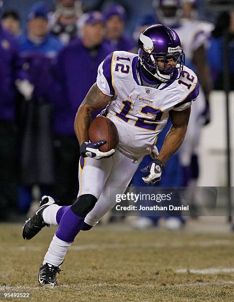 Percy Harvin of the Minnesota Vikings runs after a catch against the Chicago Bears at Soldier Field on December 28, 2009 in Chicago, Illinois. The...