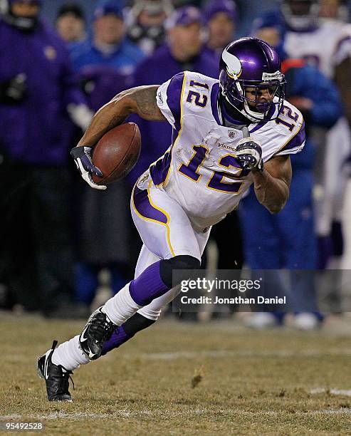 Percy Harvin of the Minnesota Vikings runs after a catch against the Chicago Bears at Soldier Field on December 28, 2009 in Chicago, Illinois. The...