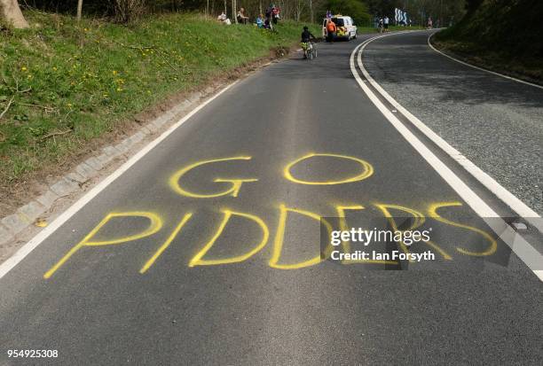 Graffiti is chalked on the road to support the riders as fans gather on the iconic Sutton Bank waiting for the third stage of the Tour de Yorkshire...