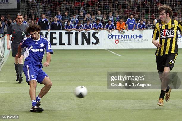 Halil Altintop of Schalke battles for the ball with Wiljan Pluim of Arnheim during the Indoor Football Cup match between Schalke 04 and Vitesse...