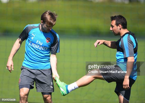 Nacho Monreal and Santi Cazorla of Arsenal during a training session at London Colney on May 5, 2018 in St Albans, England.