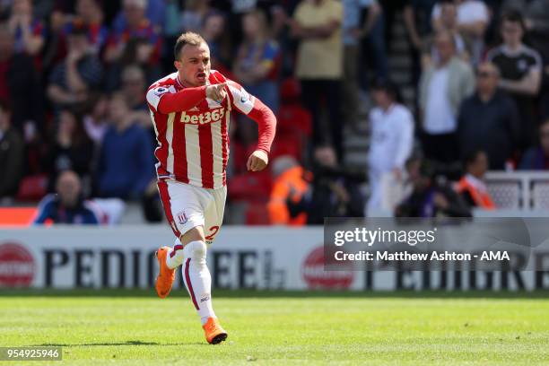 Xherdan Shaqiri of Stoke City celebrates after scoring a goal to make it 1-0 during the Premier League match between Stoke City and Crystal Palace at...