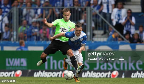 Florian Pick of 1. FC Magdeburg and Janik Bachmann of Chemnitzer FC compete during the 3. Liga match between 1. FC Magdeburg and Chemnitzer FC at...