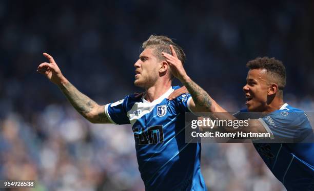 Philip Tuerpitz of 1. FC Magdeburg celebrates after scoring his team's third goal with Marcel Costly of 1. FC Magdeburg during the 3. Liga match...