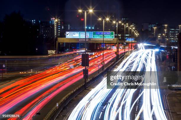 leeds skyline with light trails - leeds skyline stock pictures, royalty-free photos & images