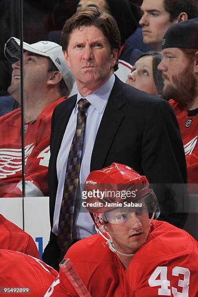 Head coach Mike Babcock of the Detroit Red Wings watches his team play the Columbus Blue Jackets on December 28, 2009 at Nationwide Arena in...